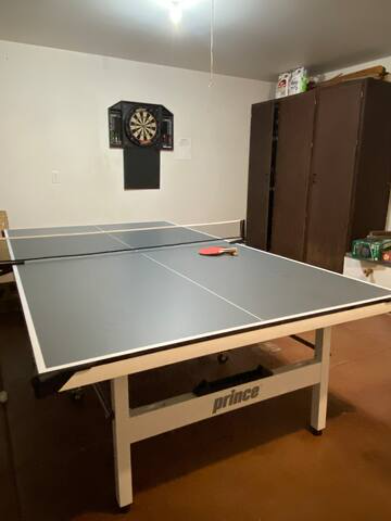 Ping-pong and darts game room