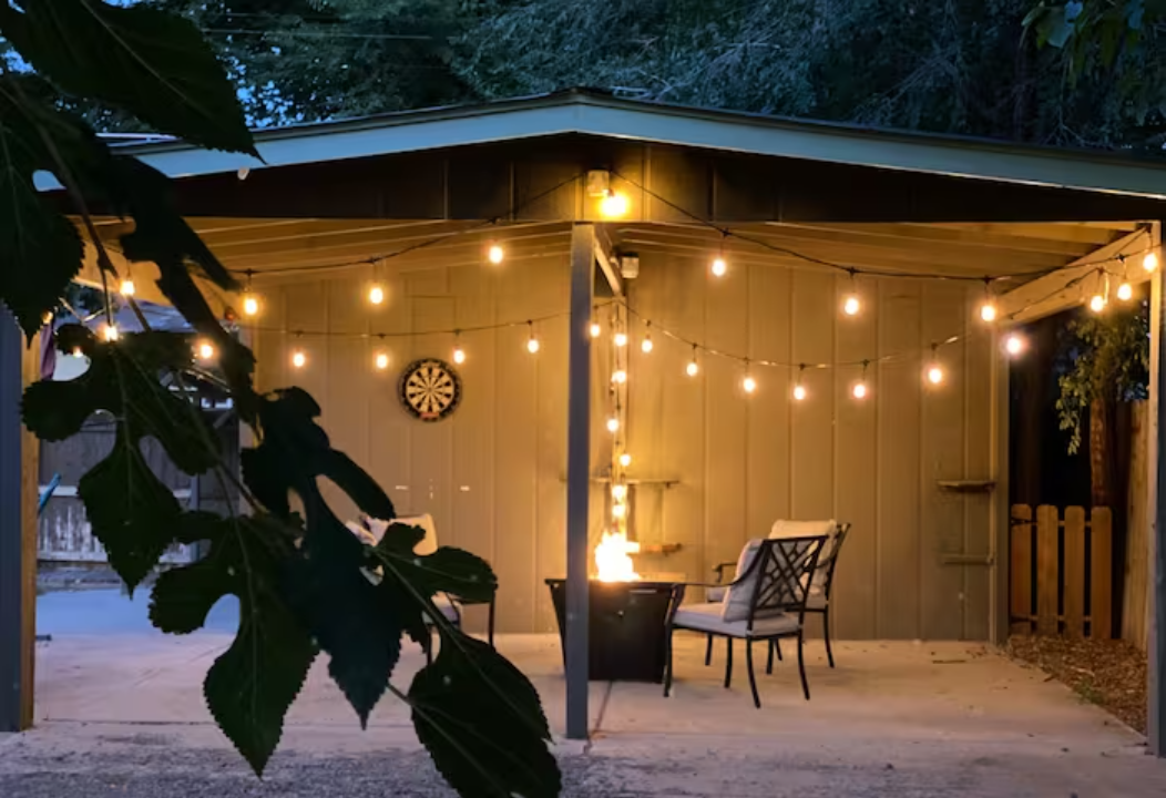Maple Cabin backyard patio with string lights