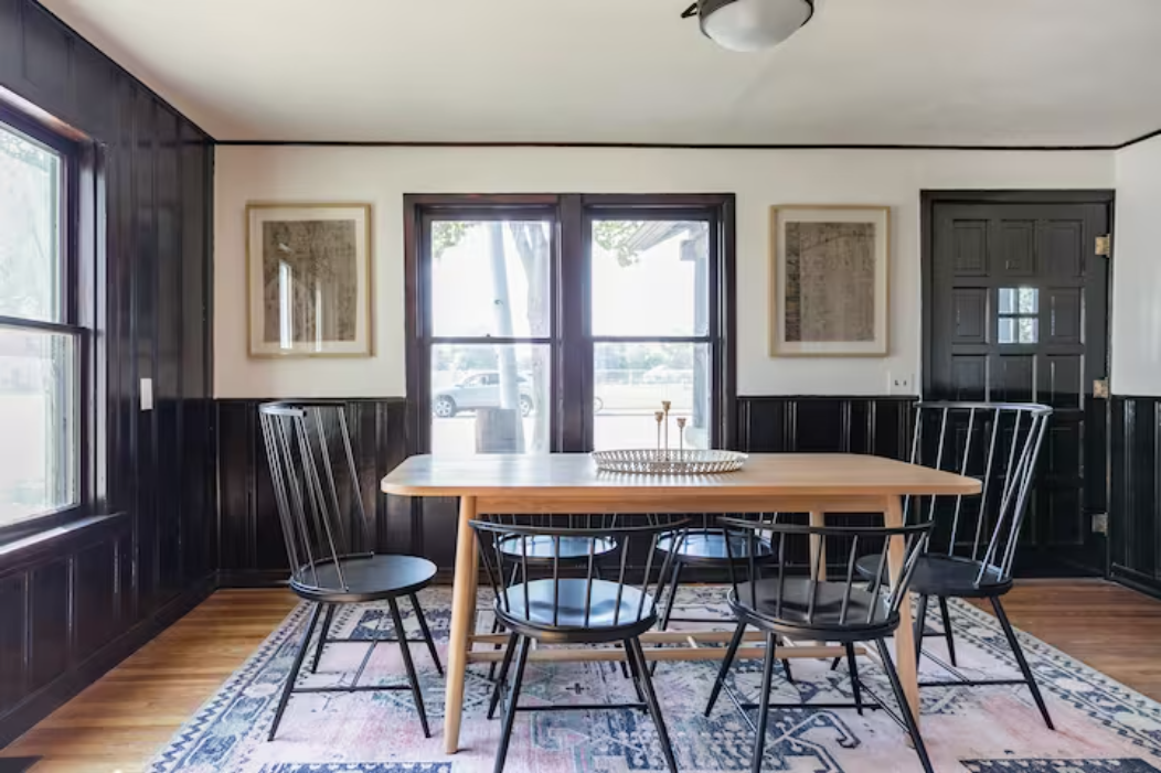 Dining room with dark wainscoting